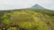 Mayon Volcano near Legazpi city in Philippines. Aerial view over rice fields. Mayon Volcano is an active volcano and