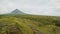Mayon Volcano near Legazpi city in Philippines. Aerial view over rice fields. Mayon Volcano is an active volcano and