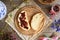 Mazanec, traditional Czech sweet Easter pastry, with butter and plum jam, top view