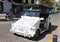 Mazatlan, Mexico - November 9, 2022 - A white Pulmonia, a golf-cart looking taxi