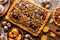 Mazurek pastry, traditional Polish Easter cake made of shortcrust pastry,  chocolate cream, candied fruit, nuts and almonds