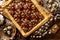 Mazurek pastry, traditional Polish Easter cake made of shortcrust pastry,  fudge caramel cream, candied fruit and almonds, close u