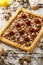 Mazurek pastry, traditional Polish Easter cake made of shortcrust pastry,  fudge caramel cream, candied fruit and almonds, top vie