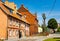 Mazurska street with vicarage house of St. John Evangelist church in historic old town center of Bartoszyce in Poland