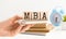 MBA - Master of Business Administration. Wooden letters spelling. MBA writting on wooden cubes on financial documents background