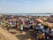 MBour, Senegal- April 25 2019: Unidentified Senegalese men and women at the fish market in the port city near Dakar. There are