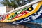 Mbour, Senegal: Detail of colourful fishing boats stranded in the sand