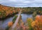 McClure storage basin with old 510 bridge surrounded by fall foliage