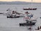 McCovey Cove filled with motorboats, sailboats, Police boats, an