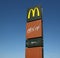 McDonald`s, mcDrive and mcCafe signboard against blue sky, in the new opened restaurant from the american fast food company.