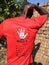 MDC supporter in Zimbabwe showing t-shirt message.