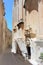 Mdina, Malta, August 2015. Entrance to the Catholic chapel on the narrow street of the old city.