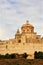 Mdina, Malta, July 2014. View of the main Catholic cathedral of the city from the side of rural fields.