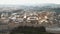 Mdina, outside city walls overlooking the cityscape limestone buildings in Malta - Ascending panoramic aerial shot