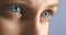 ME18-02-R-21. Blue eyes, eyesight and healthy vision of a woman for contact lenses and optometry awareness. Closeup zoom