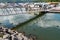 Mead Township, Pennsylvania, USA August 3, 2021 Ducks under a metal walkway leading to docks at the Kinzua Wolf Run Marina