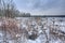 Meadow covered with snow in winter.