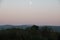 Meadow field with moon view