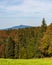 Meadow, forest and Lysa hora hill in autumn Moravskoslezske Beskydy mountains in Czech republic