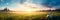 Meadow Sunrise scenic panorama with a sun-kissed meadow, showcasing the beauty of morning light.