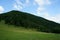 Meadows and forests above Jasenova with hills of Mala Fatra National Park, Slovakia