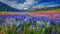 Meadows full of colorful flowers in spring with mountains in the background. AI Generative