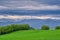 Meadows over Hybe village and Low Tatras mountains