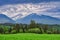 Meadows over Hybe village and West Tatras mountains