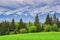 Meadows over Hybe village and West Tatras mountains