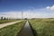 Meadows, roads and canals in water storage Eendragtspolder in Zevenhuizen