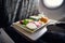 meal Economy Class. Airlines. for food on the plane. to feed the passengers. food set close-up top view. sausage with salad and