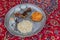 Meal in Iran - Grilled fish with a salad, yogurt, eggs and ri