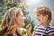 They mean the world to each other. a mother and her little daughter bonding together outdoors.