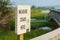 Measure Crabs Here sign along a boardwalk at Assateague