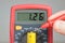 Measuring battery voltage with multimeter