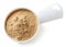 Measuring scoop of maca powder