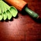 Measuring spoons and antique wood rolling pin with painted green handle