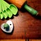 Measuring spoons, heart cookie cutter and antique wood rolling pin with painted green handle