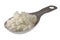 Measuring tablespoon of cottage cheese