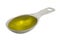Measuring tablespoon of olive oil