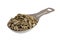 Measuring tablespoon of sunflower seeds