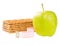 Measuring tape, crispbread and green apple isolated