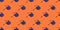 Measuring tapes on an orange background, pattern, hard shadows. Construction tools, repairs. Background for the design