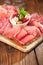 Meat antipasti Platter of Cured Meat, jamon, olives, sausage,