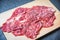 Meat beef slice on wooden cutting board for cooked or Sukiyaki Shabu shabu Japanese foods Asian cuisine - Fresh beef raw