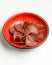 Meat bowl with carpaccio meat served over white background. Georgian cuisine concept