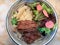Meat Bowl with Couscous and Salad at Restaurant