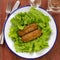 Meat croquettes with lettuce