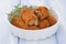 Meat croquettes in white dish