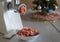 The meat grinder and forcemeat with chopped veal meat on a table